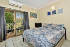  4/27 Philip Street FANNIE BAY NT 0820 This tidy and perfectly located townhouse is the perfect buy for any keen investor or first home buyer. Upstairs features 2 large double bedrooms both with oodles of built in cupboard space and new split system air-conditioners. Each have large floor to ceiling glass sliding doors which open out onto 2 separate private balconies. The kitchen has plenty of cupboard and workspace, with large bay window overlooking the secluded courtyard. There is a large living and dining space flowing off the kitchen. There is a courtyard at the rear of the property which has an in-ground sparkling slate spa, large garden storage shed, a gate to access Hinkler Crescent and plenty of room for the family pet. Just a short stroll to my favourite coffee shop the Cools Spot, Fannie Bay Supa Pizza and the local supermarket. Take romantic strolls to East Point Reserve, catch the sunsets, or have a picnic. Just minutes to Parap School, Darwin High School and the Darwin CBD. Wonderful Fannie Bay. - 2 private balconies - Spacious kitchen - Large living and dining room - Great flow through breezes - Paved private courtyard - In ground spa - Close to shops, schools and beach... 