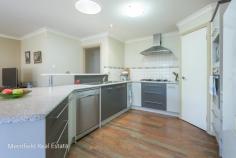  36 Meananger Crescent Bayonet Head WA 6330 $375,000 Spacious, sunny rooms, modern appointments and top-notch presentation make this outstanding property a must-see for families and couples in the market for a smart new home. It caters to all members of the family with recreation space, a workshop with power, garaging and stacks of room for relaxing and entertaining. In the popular suburb of Bayonet Head, you can enjoy close proximity to good schools, fishing, water sports and a shopping centre, as well as being only an approx. 12-minute drive from Albany’s CBD. Being on this side of Albany means you are only a short bike ride (approx. 20 mins) from Emu Point or Middleton Beach. Just imagine those gorgeous Albany days riding down to Emu Point Café with the family. With a partly rendered façade of brick and a Colorbond roof, and set in pretty gardens and neat lawns, the home has terrific street appeal. The interior is just as impressive. All the rooms are well proportioned and finished with stylish décor, timber venetians and quality flooring. A big, open living room is zoned into dining, family and lounge areas. This inviting, air-conditioned room has three windows as well as glass doors leading out to the rear of the 859sqm block. Well appointed and finished with attractive cabinetry in latte hues, the kitchen includes a corner pantry, dishwasher, wall oven and five-burner gas cooktop. There’s space for a barbecue and a family-sized outdoor setting on the undercover rear patio, which overlooks the private back garden. At the front of the home is the sizeable master bedroom with a walk-in robe, another built-in robe and a huge ensuite with a corner spa bath, double shower, twin vanities and toilet. The other bedrooms, both queen size with walk-in robes, share the nearby second shower room and toilet. There’s cabinetry in the good-sized laundry at the back door, and a linen and broom cupboard besides. The back yard is a real treat, with several fruit trees, two rainwater tanks and space for growing veggies. In addition to the double garage at the front – with undercover access to the home – there’s vehicular access to the back yard and a freestanding garage-workshop. Ideal for storage (dingy, trailer, 3rd vehicle?), this has a roller door and power connected. This modern home promises an easy lifestyle and is sure to have wide appeal with discerning buyers. What you need to know: – Partly rendered brick and Colorbond home – 859sqm block with side vehicular access – Popular suburb close to good schools, fishing, water sports, 12 mins to CBD – Double garage plus freestanding garage-workshop – Spacious rooms, modern décor and finishing – Big, air-conditioned open living area – lounge, dining, family room – Modern kitchen with dishwasher, pantry – Generous undercover patio overlooks back yard – Master bedroom with walk-in robe and en suite with spa bath, double shower, twin vanities, toilet – Two big double bedrooms with walk-in robes – Shower room and toilet – Laundry – Attractive gardens front and back – Fruit trees, two rainwater tanks, space for planting veggies – Exemplary presentation – Council rates $2,426.49 – Water rates $1,427.45.. 