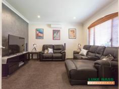  8 Challenger Place Melville WA 6156 $929,000 Stunning, picturesque, breathtaking, alluring, impressive, quality are all words that I would use to describe this gorgeous four bedroom two bathroom imposing family home. DON’T TAKE MY WORD FOR IT, COME AND SEE FOR YOURSELF! From the minute you enter, this faultless home will captivate you with its show home presentation and quality fixtures and fittings. You will not want to leave! Add to this the prime location, sought after street, walking distance to the local shops, Blend coffee shop and proximity to the schools, you now have a property that is simply hard to beat. Upon entry, you are greeted with the spacious home theatre with double french doors, which is opposite the shoppers entry to the double remote controlled garage. The laundry, separate WC/ powder room and staircase are also accessed from the front foyer. The hub of the home is at the rear of the property. Here you will find The jaw dropping gourmet kitchen, dining, family and games room. The kitchen is a chef’s delight, with an abundance of cupboards, granite bench tops, six burner gas cooking hob, dishwasher, feature lighting and a walk in pantry/scullery. The kitchen overlooks the large meals area, spacious family room, and the large double door games room, which accesses the backyard through by-folding doors. Fabulous for a family that loves to entertain. Upstairs you will find the master suite, three double sized guest bedrooms with double built in robes, a relaxation/reading nook, the guest bathroom, separate second WC, double door linen cupboard, an extra walk in linen cupboard and access to the balcony. The master suite is impressive and spacious, with views to the city, a generous ensuite and large walk in robe. The backyard is delightful and low maintenance, with an under cover entertaining area, a casual seating area opposite the spa with artificial grass, a vegetable patch at the rear and feature walls. Other amazing features of this property include city views from the front of the property, solid Tasmanian Oak floors, three WC’s, split system heating and cooling, gas bayonets, gas infinity hot water system, front balcony, alarm system, intercom, reticulation, plus much much more. Rest assured, you will not have to compromise on anything here. View by appointment or look out for the advertised home opens. 
