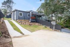  11A Lower Coast Road Stanwell Park NSW 2508 Investors seeking a great rental return will be impressed with the numbers on this property. Featuring two newly constructed semi relocatable dwellings, each with separate leases in place to provide an astute investor with above average returns. The dwellings each comprise two bedrooms, one bathroom, open plan living room / kitchen and off street parking. The property's location is a short stroll to Stanwell Park village shops and cafes, patrolled beach and primary school. The future options include construction of a large home with ocean views or keep as is for the rental return. Choice is yours! Landscaped Private driveway and off street parking Private fenced backyard Sun-filled interiors NBN already connected to both houses and separate metering... 