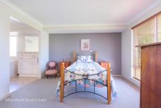  36 Meananger Crescent Bayonet Head WA 6330 $375,000 Spacious, sunny rooms, modern appointments and top-notch presentation make this outstanding property a must-see for families and couples in the market for a smart new home. It caters to all members of the family with recreation space, a workshop with power, garaging and stacks of room for relaxing and entertaining. In the popular suburb of Bayonet Head, you can enjoy close proximity to good schools, fishing, water sports and a shopping centre, as well as being only an approx. 12-minute drive from Albany’s CBD. Being on this side of Albany means you are only a short bike ride (approx. 20 mins) from Emu Point or Middleton Beach. Just imagine those gorgeous Albany days riding down to Emu Point Café with the family. With a partly rendered façade of brick and a Colorbond roof, and set in pretty gardens and neat lawns, the home has terrific street appeal. The interior is just as impressive. All the rooms are well proportioned and finished with stylish décor, timber venetians and quality flooring. A big, open living room is zoned into dining, family and lounge areas. This inviting, air-conditioned room has three windows as well as glass doors leading out to the rear of the 859sqm block. Well appointed and finished with attractive cabinetry in latte hues, the kitchen includes a corner pantry, dishwasher, wall oven and five-burner gas cooktop. There’s space for a barbecue and a family-sized outdoor setting on the undercover rear patio, which overlooks the private back garden. At the front of the home is the sizeable master bedroom with a walk-in robe, another built-in robe and a huge ensuite with a corner spa bath, double shower, twin vanities and toilet. The other bedrooms, both queen size with walk-in robes, share the nearby second shower room and toilet. There’s cabinetry in the good-sized laundry at the back door, and a linen and broom cupboard besides. The back yard is a real treat, with several fruit trees, two rainwater tanks and space for growing veggies. In addition to the double garage at the front – with undercover access to the home – there’s vehicular access to the back yard and a freestanding garage-workshop. Ideal for storage (dingy, trailer, 3rd vehicle?), this has a roller door and power connected. This modern home promises an easy lifestyle and is sure to have wide appeal with discerning buyers. What you need to know: – Partly rendered brick and Colorbond home – 859sqm block with side vehicular access – Popular suburb close to good schools, fishing, water sports, 12 mins to CBD – Double garage plus freestanding garage-workshop – Spacious rooms, modern décor and finishing – Big, air-conditioned open living area – lounge, dining, family room – Modern kitchen with dishwasher, pantry – Generous undercover patio overlooks back yard – Master bedroom with walk-in robe and en suite with spa bath, double shower, twin vanities, toilet – Two big double bedrooms with walk-in robes – Shower room and toilet – Laundry – Attractive gardens front and back – Fruit trees, two rainwater tanks, space for planting veggies – Exemplary presentation – Council rates $2,426.49 – Water rates $1,427.45.. 