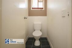 1/250 Brisbane Terrace Goodna QLD 4300 $249,000 This is one exceptional purchase for the astute investor A 3 bedroom half duplex with the most amazing tenants in place paying an amazing $310 per week and leased until mid April 2020 At A Glance; 3 bedrooms with built in wardrobes. Polished concrete floors everywhere except the ceramic tiles in the wet areas Air conditioned, ceiling fans and security screens for all year round comfort Modern kitchen with breakfast bar, electric cooking and range hood and dish-drawer dishwasher 2 way bathroom with access from hallway and the master bedroom giving the convenience of an Ensuite bathroom without the extra cleaning. Open plan living and dining Separate Laundry with immediate access to the yard and washing line Water tank for free water for your plants and grass Single lock up garage Side access for a trailer or boat Fully fenced yard with extra fencing to separate the rear yard from the front Sleeping Body corporate between this property and adjoining property Perfect location – high off the street, close to public transport and parks Amazing tenants paying $310 per week with lease in place until Mid April 2020 – rent paid on time all the time and they keep a very well maintained and tidy home. Make sure you are quick off the blocks for this one as it is one very tidy property in a great area with perfect tenants. Call Sarah-Jayne Hall from First National Westside today. 