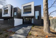  3/7 Hardman St, O'Connor ACT 2602 $1,020,000 This near new immaculately presented townhouse is set over 2 levels and has been built by one of Canberra’s leading boutique builders to the highest of standard. The ultra-modern design allows for flexibility with a generously proportioned interior. What you love - A comfortable and stylish lifestyle - Luxurious fixtures and fittings throughout the property - Northerly aspect and an abundance of natural light - Quality finishes to the exterior and interior Where - Nestled on a quiet tree lined street in the Inner North with a warm sense of community - Stroll to the ever-popular O’Connor shops (The Duxton, IGA and other eateries) - Walking distance to Light rail, City Centre, ANU and so much more - Short cycle to Lake Burley Griffin, Nature reserves and quality schools Highlights - Master bedroom with ensuite (double vanity) - Fantastic kitchen with stainless steel appliances, including a dishwasher & induction hotplates - Second living area upstairs - Reverse cycle air conditioning throughout the home - Remote single garage with internal access - Large paved alfresco area and private balcony off upstairs living area Practical information - Separate water meter - Coded front door access and intercom system - Double glazing throughout - Instant gas hot water system - Drive through garage for second vehicle to be parked - 3rd toilet located downstairs - Built in robes to all bedrooms - Water tank The Numbers - Boutique complex of 3 - Upstairs 83.7m2 - Downstairs 54.4m2 - Garage 25.9m2 - Total: 164m2 - Thermal wall insulation – R 2.5 - Thermal ceiling insulation – R 5.0 - General Rates: $3,114 per annum approx. - Land Tax: : $4,608 per annum approx. - Strata Fees: $1,356 per annum approx. - EER: 5 - Built 2018 Don’t miss this fantastic opportunity to own one of Canberra’s best homes. 