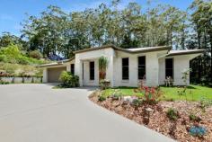  28 THE PARKWAY PLACE MAPLETON QLD 4560 $600,000s BIT ABOUT THE PROPERTY: If functional and aesthetic space is a buyer priority, this Mapleton home has plenty of appeal, with 268m2 of tasteful living and entertaining space, 2242m2 of landscaped grounds and room for extra vehicles. The property nestles among other quality homes in a winding cul-de-sac in a beautiful natural setting only 1km to the heart of Mapleton Village with its historic tavern and a range of eateries and amenities. The steel-framed residence is only 3 years old, very well built and clearly well maintained. With 4 generous bedrooms, 2 bathrooms, a study and choice of living areas, the residence offers a superb lifestyle for a range of buyers. WHY PICK 28 THE PARKWAY PLACE, MAPLETON? The home is spacious with quality design, fittings and finish, and the setting and location are excellent. Mapleton has a quieter lifestyle than the tourist centres of Montville and Maleny further along the Blackall Range, yet has an enviable range of services and facilities, including medical clinic, bowling club, library, state school, post office, cafes, IGA and service station. Quiet quality lifestyle with village convenience on the doorstep is a desirable combination. FEATURES INCLUDE: - 4 bedroom, 2 bathroom 268m2 steel-framed Dixon home just 3 years old - Quiet cul-de-sac 1km to village centre - Beautiful treed location among other quality homes - Big main bedroom with en suite and study away from other bedrooms - Spacious open plan kitchen/dining/family room - Separate large lounge room - Well-equipped kitchen with dishwasher, breakfast bar, huge walk-in pantry - Air conditioning - High quality, modern finishes - Private alfresco dining/entertainment patio off main living area - Large double lock up garage - Beautifully landscaped grounds with treed backdrop - 60,000 litre rainwater storage and envirocycle septic system - Separate driveway for storing a boat, caravan or mobile home..  