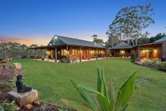  575 Binna Burra Road Federal NSW 2480 Upon arrival to this stunning private 10.25 acre lifestyle property, on one of the Hinterland’s highest positions, you will be ataken with all the highly desirable features this property has to offer. Completed just over 12 months ago, this large dual family home has been built to high specs & will appeal to buyers seeking quality, elegance & style, in a private setting & only minutes drive to Federal Village, Bangalow & down to Byron beaches. A fine example of a bespoke, master built, dual occupancy residence featuring Ironbark & Colourbond – complimentary to the natural surrounds & offering spectacular north/easterly views & westerly sunsets. Completed in July, 2019 the large 5 bedroom, 4 bathroom family home has been built to high specs with rare dual occupancy approval, to appeal to both large families & extended families with additional separate accommodation, income or home office. Conveniently positioned between Bangalow & Federal villages only minutes away, yet the quiet, peacefulness affording a sense of a millions miles from care! Additional workshop or craft room off the double garage overlooks the private northerly courtyard Perfect for retirees, large families, hinterland holidays – the choices are yours Approximately 4 acres of lush lawns and native landscaping under a maintenance system for ease of care At the far rear of the property a vehicle accessed track opens to a level grassy, peninsula surrounded by a creek - perfect for picnics, parties & magical times Separate home office or guest accommodation adjoining a 4 car “Man Shed” with bathroom, kitchen & laundry facilities A versatile floor plan which will appeal to a variety of families – with fully self contained options & income stream (currently $350 & $500pw) should this appeal. 