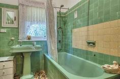  67 Monkittee St, Braidwood NSW 2622 $669,000 If it's a grand period home you've been searching for you will go a long way to find better than this solid brick beauty. Tucked away behind a cypress hedge with mature plantings across most of the 1260m2 block making privacy an absolute feature, although upon entering the front gate the beauty of this home is immediately evident. Built around 1937 by a prominent local businessman as a wedding present for his daughter the property has only ever changed hands on one occasion. There are three large bedrooms, two with open fireplaces. An expansive formal dining room also has its own fireplace, a great room where a grand piano and candelabra certainly wouldn't look out of place. The formal lounge room at the front of the home is the perfect place to greet guests for those formal dinner parties or martinis and hors d 'oeuvres on the front veranda for the more fresh approach on a balmy summers evening. A large enclosed wrap around veranda at the rear of the home provides another area for more casual living and looks out across the leafy backyard. Unlike many homes from this era most things remain original with leadlight windows, decorative cornices , picture rails and high ceilings- this truly is a grand home. NB This property is currently tenanted . Inspections will be on an appointment basis only with the exclusive agent. 