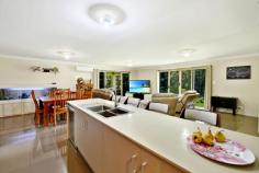  28 THE PARKWAY PLACE MAPLETON QLD 4560 $600,000s BIT ABOUT THE PROPERTY: If functional and aesthetic space is a buyer priority, this Mapleton home has plenty of appeal, with 268m2 of tasteful living and entertaining space, 2242m2 of landscaped grounds and room for extra vehicles. The property nestles among other quality homes in a winding cul-de-sac in a beautiful natural setting only 1km to the heart of Mapleton Village with its historic tavern and a range of eateries and amenities. The steel-framed residence is only 3 years old, very well built and clearly well maintained. With 4 generous bedrooms, 2 bathrooms, a study and choice of living areas, the residence offers a superb lifestyle for a range of buyers. WHY PICK 28 THE PARKWAY PLACE, MAPLETON? The home is spacious with quality design, fittings and finish, and the setting and location are excellent. Mapleton has a quieter lifestyle than the tourist centres of Montville and Maleny further along the Blackall Range, yet has an enviable range of services and facilities, including medical clinic, bowling club, library, state school, post office, cafes, IGA and service station. Quiet quality lifestyle with village convenience on the doorstep is a desirable combination. FEATURES INCLUDE: - 4 bedroom, 2 bathroom 268m2 steel-framed Dixon home just 3 years old - Quiet cul-de-sac 1km to village centre - Beautiful treed location among other quality homes - Big main bedroom with en suite and study away from other bedrooms - Spacious open plan kitchen/dining/family room - Separate large lounge room - Well-equipped kitchen with dishwasher, breakfast bar, huge walk-in pantry - Air conditioning - High quality, modern finishes - Private alfresco dining/entertainment patio off main living area - Large double lock up garage - Beautifully landscaped grounds with treed backdrop - 60,000 litre rainwater storage and envirocycle septic system - Separate driveway for storing a boat, caravan or mobile home. 