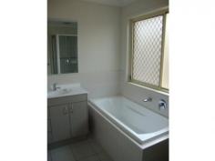  17B Focus Street, Ormeau, Qld 4208 -  Bloor Homes Property Management Modern, Spacious 2 storey at Ormeau, quiet and private! House   - Ormeau  QLD 17B FOCUS STREET, ORMEAU Large Spacious 3 bedroom, 2 bathroom home, located in the heart of Ormeau – Jacob’s Ridge Estate. This two level townhouse is fully tiled downstairs and has air conditioning to living rooms and master bedroom (upstairs), Modern kitchen has plenty of cupboard space and dishwasher. Two bedrooms are on the ground floor with main bathroom, and separate toilet. Master bedroom is upstairs with large walk-in robe, ensuite … and its own air conditioning! Double lock-up garage, fenced yard, water tank, security screens, gas hot water, ceiling fans throughout and extra storage under stairs make this property well worth an inspection. Phone us today on 5519 9220.or 0432 832355 to book a viewing time. Applications www.bloorhomes.com.au 