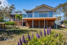  20 Tradewind Terrace SANDFORD TAS 7020 $775,000+ 20 Tradewind Terrace is an expertly renovated three bedroom two bathroom home with a focus on contemporary living. The home is set over one expansive level with an open plan kitchen, dining and living area leading to a substantial deck overlooking one of Hobart’s most picturesque views. Situated on an extremely private internal 2.5 hectare allotment with only a small reserve separating the property from the water’s edge; the home offers an entirely unique and irreplaceable aspect. The property features several outbuildings, the main shed with power and a double garage adjoining the home as well as a vegetable garden and partial landscaping for the green-thumb. Within the home, ease of living is a priority. All bedrooms have built in wardrobes with the master featuring ensuite and walk-in robe. The kitchen has been updated with entertaining and functionality in mind with storage under the kitchen bench on both sides, SMEG gas cooktop and oven and a clean neutral finish to complete the aesthetic. The space within the dining and living area is ample with a stunning fireplace the centrepiece to be used in the colder months and a Fujistu reverse cycle heat pump to cool off in the summer. The entire home lies upon the warm, recently polished timber flooring which is easily maintained and completes the home. 20 Tradewind Terrace is only minutes drive to Lauderdale Shopping Precinct including the Hill Street Grocer and 25 minutes to Hobart’s CBD. The ultimate balance between lifestyle, liveability and proximity. Contact Cam Rogers today to arrange your inspection. 