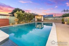  26 First Avenue Sandgate QLD 4017 $998,850 This double storey family home in a quiet one-way avenue, arguably one of Sandgate’s best streets, just footsteps to the water, offers elegant, effortless living with all the bells and whistles to ensure the quintessential bayside lifestyle…in fact, lashings of it! Across two levels, the home is complete with five bedrooms, three bathrooms, study, separate living areas, well-equipped contemporary kitchen, sparkling inground pool large enough do laps in, poolside sunbathing terrace and gazebo, double lock up carport plus storage, on a fully fenced 405m2 block with no grass to mow! Presentation shines, and features include air-conditioning, ceiling fans, quality window furnishings, natural gas cooktop, timber benches in kitchen, elegant built-in cabinetry in media room, spa bath in main bathroom, dual vanities in ensuite, security screens, solar power, gas hot water, new smoke alarms, pool cover with storage plus plumbed in ready for heat pump (if required), watering system for gardens, and there’s even glimpses direct to the Bay! Designed for low maintenance Queensland living where alfresco entertaining and relaxation is ‘top of mind’…this is a wonderful home to host all your celebrations, and everyone is going to love this pool! Chill the champagne and sit in the gazebo, soaking up the good life and don’t forget to count your blessings in the process; this is a lifestyle to envy, and it can be all yours to savour! The floor plan allows for versatile options, especially if all the bedrooms aren’t needed for sleeping purposes – how about a music room, gym, library??? You can never have too many rooms right, and the media room is the perfect spot to binge-watch the latest Netflix series or the Rugby World Cup with a few drinks – shut the doors, put your feet up, and let the show begin. Located in a premium Sandgate pocket just metres to the beach, miles of waterfront bike/walking paths, local parks, Woolworths and local shops, and dining, plus in close proximity to the iconic Shorncliffe jetty, local public and independent schools, sporting facilities, and medical centre – this is as family-friendly as it gets. Brisbane CBD is approximately 30 minutes away…don’t drive, jump on the train (only a five-minute walk), it couldn’t be easier! Boating, fishing, kayaking, paddle-boarding, swimming, cycling, walking, jogging, entertaining, relaxing, shopping, dining…this is lifestyle nirvana. Invest now in your slice. Contact us to arrange your very own private inspection today. Open 7 days Phone 07 3203 6001 (24 Hours) FEATURES WE LOVE : • Bayside family living with the lot! • 5 bedrooms, 3 bathrooms, study • Separate living areas, quality kitchen • North facing alfresco entertaining • 9.8×5.7m inground pool will delight • Double lock-up carport + storage • Fully fenced 405m2, no grass to mow • Impeccable presentation throughout • Contemporary, quality interiors • Air-conditioning, fans, gas hot water • 5kW solar power with 20 panels • Water glimpses, just footsteps to the Bay • Walk to shops, dining, parks, train • One of Sandgate’s premium streets • Invest now in your slice of Bayside Bliss! 
