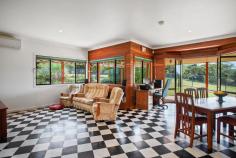  23 Callistemon Dr Federal NSW 2480 $1.25m Escape from the hustle & bustle, to one of the hinterlands highest & most peaceful positions. On 2½ acres is this timber & Colourbond home positioned high on a gently sloping block on a quiet no through road – with established foliage around the fenced boundaries. Set well back from the road with lighthouse glimpses - this masterbuilt 3 bed, 2 bath family home features timber throughout, the living room with a raked cathedral ceiling adjoins the dining area, whilst the family room & new granite & timber kitchen with Euro appliances, pantry & servery – all face the north. Currently the south wing hosts 3 bedrooms, the master with ensuite however with the potential to convert the double lock up garage easily into a 4th bedroom or granny flat – all under the one roofline. Full length wrap around verandahs to the home & adjacent to the home is an additional large double garage with benches to accommodate either cars, machinery or workshop.  Features Verandah Indoor entertainment area Outdoor entertainment area Undercover outdoor area Fireplace Water Tank... 