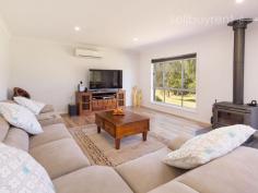  5789 River Road Talmalmo NSW 2640 $689,000 Rarely does an opportunity arise to purchase a genuine Murray River frontage property. 'ALMISHA' offers you the comfort of space and serenity right on the waters edge with direct river frontage. Situated at a deep water section of the Murray River and wrapped by ageless River Red Gums, our property is a perfect combination of river frontage property with an excellent four year old residence, quality built by Lewis Homes of Wodonga. With a maintenance free steel frame and situated on approximately 4.5 acres of private land, the lifestyle you can have here is simply superb. Well maintained and spacious lawn areas run directly down to the river bank, lined with native trees and shrubs, along with handmade seating and steps for easy access, your own part of the mighty Murray River is truly at your door step. This beautifully presented home is in pristine condition and is centred in the middle of the allotment to maximise the best of the Murray River views from the family room and alfresco areas. The entire open plan living area has spectacular views regardless of the seasons. Incorporating three queen sized bedrooms plus a separate study, a main open plan living area with a formal lounge, the floor plan of this home is practical and well thought-out. The main bedroom offers a full en-suite, complete with double shower, dual basins and walk-in-robe. The main family bathroom offers a large bath and fitted with quality stainless tapware and fittings. A very attractive “Chefs” kitchen is complete with stainless steel appliances, gas cook top (LPG), soft close cabinetry, oversized walk-in pantry plus extensive cupboard and bench space. Comfortable year round temperature is supplied via a large slow combustion wood heater, split system reverse cycle air conditioner, as well as ducted evaporative cooling throughout. A well-appointed laundry is fitted with a huge walk-in linen / storage cupboard. An extra-large garage with two car accommodation plus workshop / third car space, completes this family home under roof. Step outside and walk down to the very impressive 12m x 8m colorbond shed / workshop that offers extra accommodation (including kitchen facilities) for when extra family or friends arrive. The mezzanine floor offers one bedroom and two additional bedrooms are available downstairs. Complete with power, water and LPG connections, this makes for a great addition to this already well appointed property. Water to this property is taken care of as part of the “Dora Dora” Water Syndicate, a privately owned and administered scheme, which supplies water to the gardens, shedding and surrounds. A rainwater catchment tank of 26,000L supplies domestic use water. Almisha's location is easily accessed situated in the village environment of Talmalmo. A quiet and peaceful location above the Lake Hume District and only 78km (approximately) from the twin cities of Albury, Thurgoona and Wodonga. 