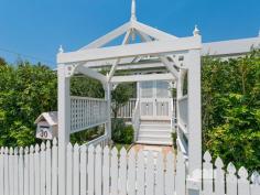  30 VICTORIA AVENUE, Woody Point |  Waterfront Properties Redcliffe Stunning renovated cottage on 1012m2 block! Nestled behind a white picket, tree-lined fence this immaculately presented property has much more to offer than meets the eye. Having undergone a top to bottom tasteful renovation in recent years this home is move-in ready and is sure to impress from the formal entry to the open plan kitchen and living areas that flow effortlessly out to a fantastic covered deck overlooking picturesque gardens. Additional features of this charismatic property include: - 3 Good size bedrooms - Master with WIR - Polished timber floors, high ceilings, VJ walls - Formal entry - Multiple formal and informal living areas - Modern, gourmet kitchen with gas cooktop, stone benchtops + good size pantry and island bench - 2 tastefully renovated bathrooms - Private front verandah - Air-conditioned main living - Spacious laundry - Side access with automated gate through to the huge man-haven, including lock-up garage + room to store the boat/trailer/caravan and anything else you may have under cover - 2nd driveway with offstreet park - Garden shed - 1012m2 of beautifully landscaped land with fresh water bore - Just over 300m to the waterfront, walking distance to Bramble Bay Bowls Club, Pelican Park and Aquasplash! - 20 min to Brisbane airport, 30 min to Brisbane CBD With far too many features to possibly list, this magnificent property is an absolute must to inspect. Call Kevin on 0418 125 356 to arrange your private inspection today! 