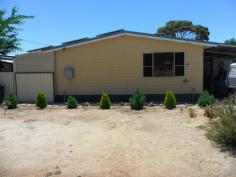  51 Bedford St Cunderdin WA 6407 $305,000 WOW!!! All the hard work has been done, just move in and sit back and relax on the front porch. This home is must see !!! Hardiplank/colourbond roof with steel frame and stumps. Foyer, 3 spacious bedrooms (main bedroom has ensuite shower recess vanity sep wc, separate lounge with tile fire, kitchen/dining with cook/top ubench oven, dishwasher, separate 2nd bathroom with shower recess vanity, separate 2nd wc, double linen cupboards, this room can be games room/theatre room/4 bedroom/office, ducted aircon, split reverse aircon, ceiling fans, verandah enclosed for outdoor entertaining, wheelchair ramp, solar panels, security system, hallway and games room connected to sound system, down lights throughout operated manually or through blue tooth, ceiling fans, colourbond lockup shed with concrete floor power sub meter plenty of power points, double gates from back lane access, carport with concrete driveway, veggies beds with automatic retic connected also to garden beds, rainwater tank, deep sewer, block size 883sqm... 