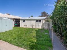  5 Allambie Crescent Wodonga VIC 3690 $325,000 This home has what you can’t often find………a bungalow with kitchen and bathroom! If you require a hobby room, home office for your business or a great teen retreat, this property is the perfect match for you. The home itself in a lovely quiet street, and access to White Box Rise or High Street Wodonga is only moments away. With secure parking, private yard and great heating and cooling, this home is a brilliant buy. - Three bedrooms, all with built-in-robes and ceiling fans. - North facing spacious lounge. - Separate dining area and kitchen with excellent bench space and stainless appliances. - Fully renovated bathroom. - Ducted heating and cooling throughout the home. - A tandem carport is available and secure behind gates or use as a huge entertaining area with side awnings already installed. - The East side of the home has a second entertaining area (with a built-in dining table) that is well shielded from the summer sun and is very private. - The bungalow is well separated from the main home and is powered and complete with kitchenette and bathroom (inc. w/c), a new 50L hot water unit has recently been installed. - The yard is fully fenced and a garden shed is also available to store your garden equipment. Ready for occupancy, look forward to moving into your new home for Christmas. 