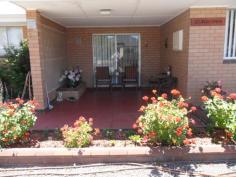  39 Yilgarn St Cunderdin WA 6407 $249,000 Immaculate Double Brick Home with Colourbond Roof, Kitchen/Dining/Lounge open living, 2 spacious Bedrooms with BIRobes, Laundry/Bathroom combined with Shower Recess WC access as well from second bedroom, Porch, back Verandah with concrete floor and rollup blinds, Electric Stove, Electric HWS, Duct Aircon, plus Split reverse Aircon, Carport, 2 Garden Sheds, Rainwater Tank, Gardens are immaculate, Fully Fenced. 