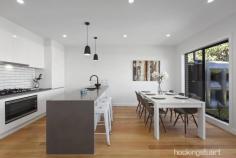  8A Cooper Avenue Altona North VIC 3025 $700,000 - $770,000 Carefully considered design and superb finishes give this townhouse a magnificent edge. With instant street appeal and a prestige interior, this is contemporary indulgence at its best. From the moment you enter it is apparent that this property separates itself from all others on the market today. Quality and longevity are two words that come to mind. Single level living with great storage options and plenty of wardrobe space. This home comprises three generous sized bedrooms, master finished with walk-in-robe & private ensuite as well as boasting a premier position at the front of the property. Come together around the high-end kitchen with features such as waterfall stone benchtops, stainless-steel appliances and sleek tiled splashbacks and feel the home flow effortlessly into open-plan family area including large living and dining that links seamlessly to the outdoor decked entertaining area and a private landscaped yard, just perfect for families or downsizing alike. With the best options at play, this is certainly an offering that cannot be passed up. With Stainless steel appliances, stone bench tops, soft close vinyl wrapped cupboards you will feel the luxury throughout. You will be located less than 13kms from the Melbourne CBD by way of city-bound freeway as well as some of the best schools in the area right on your doorstep; also moments toe the brand new multi million dollar Millers Junction shopping precinct. 