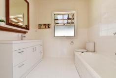  83 Avondale Road Cooranbong NSW 2265 $425,000 - $465,000 On a generous 562m2 block with this cute and well cared for picket fenced home provides a fabulous first-home buy or lifestyle investment. With functionality at its core, single-level interiors create a relaxed vibe offering a 3-bedroom/2-bathroom layout highlighted by a linked living and dining space and sunny kitchen. With potential to transform the back sleep-out into a grany flat (STCA) this home holds plenty of potential to add-value while being move-in ready. The convenience of having a shopping hub, esteemed schools and the motorway nearby increases appeal. – Single-level layout with covered front balcony to enjoy your evening drink or dinner – Three bedrooms, two include robes and there’s an ensuite to the master – Connected living and dining rooms complimented by rich hardwood floors – Sun-splashed kitchen, modern in style and appointed with electric cooking – Separate sleepout with deck and laundry ready to transform into something special (STCA) – Centrally located in Cooranbong’s heart, moments from the local shops and elite schools – A great base for Sydney or Newcastle commuters with the M1 quickly accessed Features Air Conditioning Area Views Built-In Wardrobes Carpeted Close To Schools Close To Shops Close To Transport... 