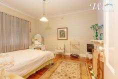 38 Ivor St Henty NSW 2658 $279,000 This home oozes character, meticulously renovated throughout to showcase a terrific example of the Federation-Californian Bungalow era. I am in love with these central hallways, Murray pine timber flooring, ornate pressed metal ceilings, spaciously extended to 10 foot. Another classic feature are the several open fireplaces throughout this magnificent home, including the master & second bedroom, then again predominantly located in the grand formal lounge room which offers ample space for a study nook or formal dining. The beautiful home comprises 3 bedrooms, 2 bathrooms, 2 living rooms and a near brand new 9m x 6m lockup garage. Set on a marvellous 1012sqm block of land, there is easy access from a side lane plus the front street with double gates to a secure yard ideal for a swimming pool installation in future or other personal requirements. There's a feeling of further space and privacy with no actual houses either side of this residence. An appealing extension has created the second family room, meals area and kitchen. Although the ceiling height is lowered only a foot in this area, you don't feel claustrophobic in the slightest in this wonderful practical home. The renovated kitchen includes a gas stove, good storage, a reverse cycle split system air conditioner and another door which leads out to the rap-around federation styled verandah's that appreciate the northerly aspect, not to mention those beautiful new Merbau timber floorboards. The main bathroom has been tastefully fully renovated, boasting a walk-in shower recess, bath, toilet and vanity. An additional shower and toilet has been installed to accommodate visitors or a larger family within the laundry configuration. A new instantaneous, efficient gas hot water service has also been installed just showing no stone was left un-turned with the current owners desire to create a brand new home feeling which didn't reflect on the contemporary architecture of today. Spoilt for choice, you can relax on the front verandah's, around the grounds or entertain undercover on a rear decked pergola. The triple lockup garage offers 2 roller doors, one remote access for car, boat or caravan storage plus room for a workshop. There is even a cute wood shed. Henty is a vibrant country town where community is actually recognised. The locals are welcoming (even to us wonderful agents) and there are several community groups, a men's shed, golf course, local schools and more. The town is a good halfway spot, where you could shop in the cities of Albury or Wagga without too much travel and still buy a home like this one, that would be an addition $100K or more in Albury's outer suburbs. 