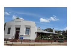  65 Abel St Boyup Brook WA 6244 $465,000 GST Inc Given the size and potential of this property, it would be a shame to miss this one! This home is residential/commercial property is on 2 titles 814m2 plus 231m2 total area 1045m2. For Sale for $465,000 GST on 231m2 Title inclusive. Business can be included by negotiation. This home has all the embellishments of the era with detailed wood work, high ceilings, 5 beautiful fire places, and wide, jarrah floorboards with plenty of storage and is sure to please the whole family. Filled to the brim with period features which is evident the moment you step into the wide entry way the hallway leads to 3 large bedrooms with built in robes, 1 bathroom, refurbished kitchen and a large dining room area and lounge room, a separate study/sunroom also offers the possibility of a 4th bedroom conversion. A staircase to the left leads you down to a large self-contained area with great commercial prospects. The property is positioned perfectly on a corner allotment for a variety of business ideas such as a retail shop, medical clinic and professional consulting rooms and would provide a great work from home opportunity. Great natural lighting, office frontage to passing traffic and pedestrians, this area houses a kitchenette and separate toilet, the long rear driveway provides additional off-street parking for customers, the opportunities are endless. The home opens to a delightful outdoor setting with a gazebo, mature fruit trees, chicken run and vegetable gardens. While enjoying the gardens and wonderful spaces throughout this home might be enough, there are café’s, bars, local shops, all on your door step with schools just a short distance away. There are so many lifestyle pleasures to enjoy in this home, entertaining friends on the large outdoor veranda whilst watching the world go by or soaking in your own inbuilt spa. Further outdoor features include: - Undercover parking for 2 cars with room for additional cars - Enclosed workshop/garage and store room - 2.5KW Solar panels For more information or to view please contact John Rich 0429 101 264 or Lisa Freer 0429 111 848 