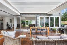  129 Webster Street Lake Wendouree VIC 3350 $2,600,000 - $2,700,000 Set amongst idyllic green gardens and mature trees on a private 1300sqm block is this enchanting period home, only metres from Lake Wendouree. One of Ballarat's most coveted locations, Webster Street is a tree-lined avenue of heritage homes and historic charm. The house was designed and built by Architect Wilfred Coltman in 1928 and retains the superb period features of the era combined with the conveniences of modern living. The original areas of the home feature wood panelling and coffered ceilings, along with solid wood doors set with leadlight glass panels. A formal entrance welcomes you, rich with the tones of dark wood and warmed by polished timber flooring. The formal living at the front of the home is full of period character, overlooking the lush gardens through the big bay window. Sliding doors lead to the huge master bedroom, with its lovely deep sills and open fireplace. The adjoining bathroom is large and beautiful, blending modern tiling and glass shower with old world features such as the clawfoot bath and fireplace. There is also a separate and spacious walk-in robe, completing the master suite. Three other bedrooms also enjoy the elegant features of the period, the largest offering coffered ceilings and a beautiful open fireplace.. Each bedroom has walk-in robes while one also has its own ensuite, which would be ideal as guest accommodation. A fifth bedroom has built-in shelves making it ideal as a possible study. A modern extension at the rear of the home houses the informal living areas. The kitchen is large and modern with new AEG appliances including induction hot plate and dual ovens, a built-in wine rack, large walk-in pantry, electrically operated overhead cupboards and drawers, marble benches and an island bench. There's even room for a double sized fridge. Reverse cycle air conditioning maintains perfect temperature control. The kitchen forms part of an open plan family area with modern dining and living spaces. A wall of windows in the family area offers garden views and glass doors lead out to the huge terrace and outdoor entertaining space with an automatic self-closing, fully adjustable louvred roof. The family living room has windows on three sides, with floor-to-ceiling height windows framing the open stone fireplace and solid cement hearth. Two sets of bi-fold windows can be opened to let the outside room become part of the living space. This is luxury and comfort combined. Throughout the older section of the home are a host of original features including high ceilings, picture rails, wooden mantlepieces, wood panelling, leadlight windows and deep windowsills. Superb light fittings add to the feeling of style and elegance. The modern wing is streamlined and beautiful, making the most of modern touches like downlights and a wine storage room. The home has hydronic heating and a ducted vacuum system throughout. Outside, a three-car garage with remote control door, and connected to water and power, mature trees and a 25,000-litre water storage tank with pressure pump complete the picture. A remote-control front gate and remote sensor lights along the driveway mean you don't have to lift a finger until you're safely parked. This is a distinguished home and a welcoming one. Properties in this area are highly sought after and this property is now offered for sale for only the third time in its life. This is a premier piece of heritage real estate in an ideal location, just a short walk from Lake Wendouree, cafes, hospitals and the finest schools. This is one of Ballarat's finest homes and it could be yours. To arrange a private inspection of this grand old home, contact Tony Douglass on 0418 555 973 today. 