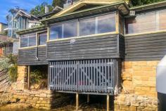  44 COWAN DRIVE COTTAGE POINT NSW 2084 This is truly a unique opportunity to secure two homes on one tittle in an idyllic tranquil deep waterfront location. On offer is a mix of two dwellings, one being a waterfront cottage boasting the real old charm of a fisherman's hut including a double garage with inclinator access. The second is a separate modern family home located on the high side of the lot comprising of 3 bedrooms, four-bathrooms, double garage and breath-taking panoramic views with inclinator access to the water's edge. - Inclinator - Eco-friendly sustainable living - A truly unique waterfront lifestyle - Perfect weekender for those looking to escape - Designed for dual living or reside and have an income - Impressive deep waterfront jetty to moore the cruiser - One of Sydney's smallest premiere waterfront communities - Moorings available to local residents on application (STNPA) - Sensational lifestyle within an exclusive community, join the Kuring-Gai Motor Yacht Club or enjoy a romantic meal at the Cottage Point Inn with sea plane access. To arrange a private inspection or for more details call Nash Varney 0432 847 245 FEATURES  Air Conditioning Built-In Wardrobes Water Front Open Fire Place Water Views Deck Outdoor Entertaining Area Workshop Remote Garage Dishwasher Eco Friendly Features Water Tank... 
