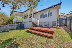  16 Trevally St Tannum Sands QLD 4680  $463,000 Have you been looking for the perfect location to settle down? Look no further - 16 Trevally Street is positioned in a prime location just a short stroll to the beach and all amenities. With an awesome timber deck with ocean views perfect for entertaining and a great big backyard and fenced front yard. Features - Great outdoor timber deck with ocean views - Timber flooring & walls throughout - Open plan kitchen/dining/lounge combined - ceiling fan & AC - Kitchen with island bench & dishwasher - Family bathroom with shower & toilet - Master bedroom with ocean views & AC - 2 more bedrooms with ceiling fans & AC - Great sized backyard with full sized cubby house - Solar hot water - Single garage with carport & extra garage located at the back of the house - Fenced front yard with external stairs to deck... 
