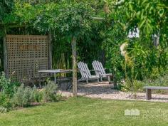  30 VICTORIA AVENUE, Woody Point |  Waterfront Properties Redcliffe Stunning renovated cottage on 1012m2 block! Nestled behind a white picket, tree-lined fence this immaculately presented property has much more to offer than meets the eye. Having undergone a top to bottom tasteful renovation in recent years this home is move-in ready and is sure to impress from the formal entry to the open plan kitchen and living areas that flow effortlessly out to a fantastic covered deck overlooking picturesque gardens. Additional features of this charismatic property include: - 3 Good size bedrooms - Master with WIR - Polished timber floors, high ceilings, VJ walls - Formal entry - Multiple formal and informal living areas - Modern, gourmet kitchen with gas cooktop, stone benchtops + good size pantry and island bench - 2 tastefully renovated bathrooms - Private front verandah - Air-conditioned main living - Spacious laundry - Side access with automated gate through to the huge man-haven, including lock-up garage + room to store the boat/trailer/caravan and anything else you may have under cover - 2nd driveway with offstreet park - Garden shed - 1012m2 of beautifully landscaped land with fresh water bore - Just over 300m to the waterfront, walking distance to Bramble Bay Bowls Club, Pelican Park and Aquasplash! - 20 min to Brisbane airport, 30 min to Brisbane CBD With far too many features to possibly list, this magnificent property is an absolute must to inspect. Call Kevin on 0418 125 356 to arrange your private inspection today! 