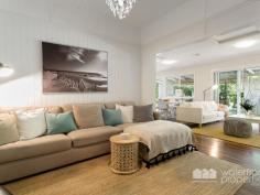  30 VICTORIA AVENUE, Woody Point |  Waterfront Properties Redcliffe Stunning renovated cottage on 1012m2 block! Nestled behind a white picket, tree-lined fence this immaculately presented property has much more to offer than meets the eye. Having undergone a top to bottom tasteful renovation in recent years this home is move-in ready and is sure to impress from the formal entry to the open plan kitchen and living areas that flow effortlessly out to a fantastic covered deck overlooking picturesque gardens. Additional features of this charismatic property include: - 3 Good size bedrooms - Master with WIR - Polished timber floors, high ceilings, VJ walls - Formal entry - Multiple formal and informal living areas - Modern, gourmet kitchen with gas cooktop, stone benchtops + good size pantry and island bench - 2 tastefully renovated bathrooms - Private front verandah - Air-conditioned main living - Spacious laundry - Side access with automated gate through to the huge man-haven, including lock-up garage + room to store the boat/trailer/caravan and anything else you may have under cover - 2nd driveway with offstreet park - Garden shed - 1012m2 of beautifully landscaped land with fresh water bore - Just over 300m to the waterfront, walking distance to Bramble Bay Bowls Club, Pelican Park and Aquasplash! - 20 min to Brisbane airport, 30 min to Brisbane CBD With far too many features to possibly list, this magnificent property is an absolute must to inspect. Call Kevin on 0418 125 356 to arrange your private inspection today! 