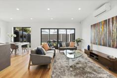  8A Cooper Avenue Altona North VIC 3025 $700,000 - $770,000 Carefully considered design and superb finishes give this townhouse a magnificent edge. With instant street appeal and a prestige interior, this is contemporary indulgence at its best. From the moment you enter it is apparent that this property separates itself from all others on the market today. Quality and longevity are two words that come to mind. Single level living with great storage options and plenty of wardrobe space. This home comprises three generous sized bedrooms, master finished with walk-in-robe & private ensuite as well as boasting a premier position at the front of the property. Come together around the high-end kitchen with features such as waterfall stone benchtops, stainless-steel appliances and sleek tiled splashbacks and feel the home flow effortlessly into open-plan family area including large living and dining that links seamlessly to the outdoor decked entertaining area and a private landscaped yard, just perfect for families or downsizing alike. With the best options at play, this is certainly an offering that cannot be passed up. With Stainless steel appliances, stone bench tops, soft close vinyl wrapped cupboards you will feel the luxury throughout. You will be located less than 13kms from the Melbourne CBD by way of city-bound freeway as well as some of the best schools in the area right on your doorstep; also moments toe the brand new multi million dollar Millers Junction shopping precinct. 