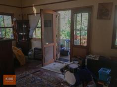  931 Oyster Shell Road Mangrove Creek NSW 2250 $650,000 Primrose Hill Cottage is on 18.86-hectare (46+ acres) mostly bush with around 2 acres of cleared land. The cottage 'a diamond in the rough' is of steel and timber construction with cedar cladding and has one bedroom and loft sleeper. The open plan kitchen/living area features a cathedral timber panel ceiling and flows out through glass panel doors on to the wrap around verandah with stunning views to the East and North. The sandstone escarpment of Mangrove Mountain plateau offers a stunning vista especially at sunsets. This beautifully picturesque setting will suit those with a love of nature, peace and serenity. The property is well protected sitting just above the creek flats of Mangrove Creek, with access to Mangrove Creek via Right of Way, there is an opportunity for some casual fishing or water sports or head up Oyster Shell road for push bike riding or bush walks in Dharug National Park. Whilst grid power is available the cottage is off grid with solar power, gas cooking, rain dam and bore water, composting toilet and slow combustion heating. NBN satellite internet is available which will provide WIFI mobile coverage. The property is zoned E2 and permitted with council consent are Bed and Breakfast accommodation and Home Occupations. The property is around 25 mins to Central Mangrove, with Spencer General store, medical centres, pharmacy, dentist, rural produce and hardware supplies, local golf clubs (with restaurants) all within around 15-25 minutes' drive, around 50 mins to Gosford City or Westfield Tuggerah, 40 mins to M1 on ramp at Calga (Northconnex motorway tunnel to M2 due for completion in 2020). Times are estimates and may vary due to weather and road conditions. For further information or appointment to inspect, please contact Michael Kidd on 0439 761 440. TO SEE ALL OUR LISTINGS, GO TO www.michaelkidd.com.au. To stay up to date with local real estate news and community events LIKE our face book page @michaelkiddpropertysales. Information has been provided by the sellers with other information being obtained from various sources and cannot be guaranteed. You must make your own enquiries as to its accuracy. Copyright Michael Kidd Property Sales P/L. 