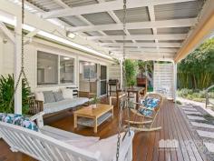  30 VICTORIA AVENUE, Woody Point |  Waterfront Properties Redcliffe Stunning renovated cottage on 1012m2 block! Nestled behind a white picket, tree-lined fence this immaculately presented property has much more to offer than meets the eye. Having undergone a top to bottom tasteful renovation in recent years this home is move-in ready and is sure to impress from the formal entry to the open plan kitchen and living areas that flow effortlessly out to a fantastic covered deck overlooking picturesque gardens. Additional features of this charismatic property include: - 3 Good size bedrooms - Master with WIR - Polished timber floors, high ceilings, VJ walls - Formal entry - Multiple formal and informal living areas - Modern, gourmet kitchen with gas cooktop, stone benchtops + good size pantry and island bench - 2 tastefully renovated bathrooms - Private front verandah - Air-conditioned main living - Spacious laundry - Side access with automated gate through to the huge man-haven, including lock-up garage + room to store the boat/trailer/caravan and anything else you may have under cover - 2nd driveway with offstreet park - Garden shed - 1012m2 of beautifully landscaped land with fresh water bore - Just over 300m to the waterfront, walking distance to Bramble Bay Bowls Club, Pelican Park and Aquasplash! - 20 min to Brisbane airport, 30 min to Brisbane CBD With far too many features to possibly list, this magnificent property is an absolute must to inspect. Call Kevin on 0418 125 356 to arrange your private inspection today! 