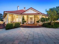  2A Hill View Rd Mount Lawley WA 6050 $2.6m STEEPED in a rich history, this stunning federation style home built circa 1916 has sweeping City views from the stunning Jarrah verandah, dining room and kitchen. Often regarded as the most prestigious street in Mount Lawley, this wonderful home on Hill View Road has rare City Views and overlooks the lights of the picturesque pedestrian bridge at Optus Stadium. Simply stunning. Providing a seamless blend between old and new, the owner (a former president of the Mt Lawley Society) has gone to considerable lengths to showcase the highly desirable features of a home from this era with modern, sophisticated living. Located on a large 1056sqm landholding, this wonderful home offers: - Up to 6 bedrooms, a study, sitting room, lounge room and dining room. This home provides for so much space that every member of the family can remain independent while living under the same roof. - Character features including high ornate ceilings as showcased in the master bedroom, decorative archways and cornices, polished Jarrah floorboards throughout, traditional picture rails and gas log fires in the original fireplaces. The home is surrounded by wide verandahs accessed by stunning french doors into immaculately maintained gardens with traditional english street lamp lighting. - Near new kitchen. Impressively large in size and characterised by a magnificent 7.2 metre island bench with porcelain finish and book matched water fall features. Also with dual breakfast bar, space for a wine fridge and abundance of pull out drawers. This would have to be one of the best lit kitchens in Perth with a choice of 80 lights to choose from and many power points. Practically designed to maintain a clean and uncluttered feel, this kitchen offers concealed pantries and appliance garage. Make your friends envious with the wide, freestanding stainless Ilve oven and cook top. Stunning outlook towards the City from an inbuilt servery lined with quality Marri bench top and stacking windows, allowing you to sit inside with a coffee in the morning and easily serve your guests on the verandah outside at night. - Impressive master bedroom with all the features of a period home - stunning decorative ceiling and gas log fire in original fireplace, to name a few. Large built in robes with floor to ceiling mirrors. The ensuite, oh the ensuite! His and hers vanity, freestanding oval shaped bath with high back, open shower with forrest rain shower head and lovely black chandelier blending perfectly with the traditional tiling. - Second bedroom designed to be the perfect home office. Private entry into this stunning space through a large verandah, where your guests can be seated before being ushered through the double french doors into the office. Constructed with in-built kitchenette and located in the north west corner of the home allowing for guests/clients to access this space without causing any distribution to the rest of the family. - Granny Flat. Approved as a habitable dwelling, the Granny Flat certainly isn't a run of the mill granny flat! Boasting a modern kitchen with space for a fridge, oven/stove, washing machine and dishwasher. Spacious modern bathroom with shower. This granny flat provides for studio style living with lots of space to entertain guests. At the eastern end, the double glazed glass doors open onto the resort style swimming pool, creating a very private and separate living space for your family and guests. An ideal teenager's retreat or accomodation for guests or live-in relatives. - Salt water resort style swimming pool. Located with a private entrance away from the home and a large area for pool side entertaining. - Air conditioned throughout but rarely needed in summer because the wide verandah surrounding the whole home provides shade and cool air. Natural cooling provided with the house cleverly designed to capture the Fremantle Doctor breeze. This is simply one of the best homes in Mount Lawley. Be quick to make it yours today... 