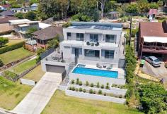  83 Ferguson Street  Forestville NSW 2087  $2,650,000 83 Ferguson Street, Forestville is proudly presented by Irina Bolshakova and Brian Fairweather of Ray White Fairweather Group. *** PLEASE NOTE: Access from Duke Street, Forestville *** If you have been searching for a Mosman-style home in a park-like setting, but have been frustrated by cost or quality, you will be enticed by this modern masterpiece... Showcasing impressive proportions, flawless interiors and a breathtaking vista of Garigal National park, this architect-designed residence is only 3 years old and offers the ultimate in family living and entertainment. Spanning two light filled levels with wraparound terraces, it reveals chic interiors enhanced by a smart layout and an abundance of natural light. Every modern luxury has been incorporated into creating this home for you - an expansive formal living & dining area suitable to host a large party, a state-of-the-art kitchen with butler's pantry and high-end European appliances, family room upstairs with wet bar and dishwasher, sleek modern bathrooms including 2 ensuites, a master bedroom with walk-in robe, ensuite and views, Jetmaster wood fireplace, sparkling saltwater pool with adjacent spa and even a sauna. Positioned on a generous north-facing 889sqm elevated block in a tranquil cul-de-sac, this remarkable home is only a short level stroll to buses, Forestville shops and schools. 5 bedrooms, office, cloak room, 4 bathrooms (with 2 ensuites), double lock up garage. Living space of 591sqm, including 211sqm of terraces Outdoor entertainment & BBQ area with gas and water connections Gazebo with views to National Park, low maintenance gardens 10m x 3m saltwater pool with gas heated spa, Finnish sauna Jetmaster wood fireplace, natural gas outlets to BBQ area, lounge and family rooms Ducted 3 zone air-conditioning, solar panels Double brick and concrete construction, double glazed sliding doors and windows High ceilings and doors, fully tiled floors Fully compliant with Australian Standard AS3959 (Construction of buildings in bushfire-prone areas) Built in accordance with Feng Shui principles Level stroll to buses, Forestville shops and schools Garigal National Park entry at end of cul-de-sac FEATURES: Air Conditioning Built-In Wardrobes Close To Schools Close To Shops Close To Transport Fireplace(S)... 