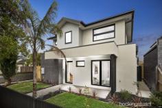  2/66 Paxton Street South Kingsville VIC 3015 $890,000 - $930,000 Thoughtfully designed and constructed with quality in mind, step inside and experience this spectacular four-bedroom, three-bathroom family home for yourself. Deceptively spacious while occupying a relatively small footprint, this home’s unique characteristics cater to the growing family who require both room to live AND stylistic design elements associated with high quality. Greeting you as you enter the glass front door is a bright, light and airy entrance way leading into the main living area. Sleek and sophisticated — polished floorboards feature throughout the ground floor, leading you past the ground-floor bedroom (serviced by the ground floor bathroom) into the main living zone. The surprisingly bright and spacious kitchen, equipped with stainless steel appliances and stone bench tops, overlooks the extended meals and living zone, brightened by natural light from the west-facing floor-to-ceiling glass panels. Further, to provide the perfect balance of indoor and outdoor living, open up the secure glass sliding doors and retreat to your generous private outdoor area - perfect for entertaining, playing - or simply a quiet and peaceful getaway. Head upstairs into three spacious bedrooms, Master bedroom with walk-in-robe and ensuite, bedrooms two and three with built-in-robes - all serviced by a large modern bathroom. As you explore the quiet upstairs living quarters, the more you'll find the design delivers an inviting yet comfortable experience. A brand new build located in the high-demand suburb of South Kingsville, short walk to local shops and cafes, and only minutes' drive from Freeway access (via main roads Blackshaws Road or Melbourne Road) this home has all the location benefits a growing family could want - peace and quiet, yet immediately accessible. Not to mention the close proximity to the Melbourne CBD! To fully appreciate this sensational home, you will need to come and experience 2/66 Paxton Street, South Kingsville for yourself! Contact Andrew Dowton 0437 300 366 or Tony Anile on 0418 314 744 for further details... 