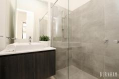  11/41 Thomson Street Maidstone VIC 3012 $699,000 - $750,000 The Thomson Residences’ is Maidstone’s boutique development which focuses on quality contemporary living, all in a central location. This 3 bedroom, architecturally designed home greets you with an open-plan, light filled living space that seamlessly flows to the spacious outdoor area. Timber floors guide you from the well-appointed large kitchen with endless stone tops, glass splash-back, stainless steel appliances and ample storage through to the spacious dining and generous living area. This home makes entertaining easy. 3m high ceilings are found on the lower level and continue upstairs in all the spacious bedrooms. The master has its own ensuite and WIR. Bedroom 2 and 3 are conveniently serviced by a central bathroom and separate toilet. The upper level is also spoilt with an oversized, private courtyard and floor to ceiling glass hallways. Become part of this exciting community, securely located on a tranquil street only 8km from the CBD. Walk to public transport, cafes, parks and schools. With Highpoint, Vic Uni and Western Hospital only minutes away... 