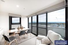  2401/120 Eastern Valley Way Belconnen ACT 2617 $619,000 Enjoy the panoramic views towards the Brindabella mountains and an outlook that looks over Belconnen’s sky line from the 24th floor of this immaculate three-bedroom apartment. Created to a superior standard, this architect designed residence provides an exceptional haven of light, space, quality and views to die for. Offering resort styled facilities such as an indoor heated swimming pool and the function centre that can be booked for celebrations alike. Truly makes you feel like your on an never ending holiday. Providing outstanding naturel ventilation, the apartment features an open plan sun filled design with lounge, dining areas, a sleek kitchen with stone bench tops, quality appliances such as dishwasher, induction cooktop, Electrolux steam oven and built in microwave. The open plan living areas flow directly out to the outdoor balcony that offer north westerly views and are simply breathtaking especially when storms roll in over the Brindabella’s. The master bedroom is segregated away from the remaining two bedrooms (both with built in robes) and has walk out access to the balcony, built-in robes and a very stylish ensuite. The apartment is serviced via Reverse Cycle air-conditioning keeping a comfortable temperature year-round and also offers two tandem car spaces along with a generous storage cage. This iconic building enjoys a village lifestyle, footsteps to vibrant eateries, major sporting complexes, Canberra university and the Belconnen’s Westfield shopping town. EER:6.0 Ask Adrian Southern, Owner Operator and Licensee of Southern Property Canberra for a FREE market appraisal of your property. Selling across Canberra for a FLAT fee $8,950.00 including GST. Please understand that open times are subject to change, so check the website (Allhomes.com.au) on the day of the scheduled open for any changes or cancellations. Disclaimer: Whilst every effort has been made to ensure the accuracy of the above and attached information, no warranty is given by the agent, agency or vendor as to their accuracy. Interested parties should not rely on this information as representations of fact but must instead satisfy themselves by inspection or otherwise. General Features Twenty fourth floor position Open plan living areas Three bedrooms Ensuite Designer inclusions Exquisite kitchen with stone benchtops stainless steel appliances including steam oven and induction cooktop Double glazed windows with superior treatments LED lighting Reverse cycle air conditioning in living areas and separate unit to master suite Security intercom access NBN network Views to the Brindabella’s Double car space and storage cage Indoor pool and function room Minutes to restaurants, pubs/bars, Belconnen Mall, Canberra University, Calvary Hospital and CISAC... 