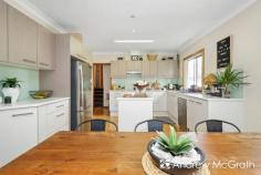  1A Bayview Street Warners Bay NSW 2282 $720,000-$770,000 Light-filled and recently revamped, this modern family home offers versatility and easy living in a central location. An easy stroll to lakeside walking trails, an array of eateries along The Esplanade and the shopping centre. Set over two air conditioned levels, the ground floor comprises a tiled entry foyer which leads into the generous multi-purpose room, and includes a study nook and internal laundry with second bathroom. Upstairs is graced by LED downlights, with polished timber floors throughout the living spaces and fresh carpet through the bedrooms. A bright family lounge room opens to the the covered verandah to overlook the front yard. Adjacent to the lounge is the open dining room and stylish kitchen appointed with stainless steel appliances. The four double bedrooms all offer built-in robes and ceiling fans, and share the modern bathroom complimented by floor to ceiling tiles, chrome fixtures, double floating vanity, glass framed shower and toilet. Outside, low-maintenance gardens and fenced lawn space with additional garden shed storage and a single lock-up garage make this the perfect home for the modern family. Take the tour to experience what this home has to offer! KEY FEATURES: Air Conditioning Built-In Wardrobes Close to Schools Close to Shops Close to Transport Garden... 