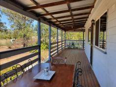  84 CRUMPTON DRIVE BLACKBUTT NORTH QLD 4306 $320,000 This 2 bedroom home with builtins, has polished floors, a woodstove to cook on in winter to keep you warm & an electric stove to cook on in summer. It has 3 ceiling fans, fully screened, and a verandah on 2 sides. The property has a 40x20 lock up colour bond garage, to park 3 cars and a workshop area with power, water , tiolet and the laundry. This property also has a large storageshed/animal shelter , which is 3/4 concreted with a 40x20 fenced area. The block has been selectived cleared with a dam, and is nearly fully fenced , with good fertile soil for growing. It backs onto the rail trail, which is popular as a walking track, horse riding , or push bike riding. 