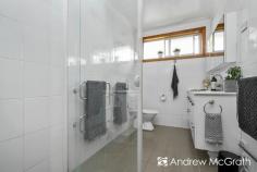  1A Bayview Street Warners Bay NSW 2282 $720,000-$770,000 Light-filled and recently revamped, this modern family home offers versatility and easy living in a central location. An easy stroll to lakeside walking trails, an array of eateries along The Esplanade and the shopping centre. Set over two air conditioned levels, the ground floor comprises a tiled entry foyer which leads into the generous multi-purpose room, and includes a study nook and internal laundry with second bathroom. Upstairs is graced by LED downlights, with polished timber floors throughout the living spaces and fresh carpet through the bedrooms. A bright family lounge room opens to the the covered verandah to overlook the front yard. Adjacent to the lounge is the open dining room and stylish kitchen appointed with stainless steel appliances. The four double bedrooms all offer built-in robes and ceiling fans, and share the modern bathroom complimented by floor to ceiling tiles, chrome fixtures, double floating vanity, glass framed shower and toilet. Outside, low-maintenance gardens and fenced lawn space with additional garden shed storage and a single lock-up garage make this the perfect home for the modern family. Take the tour to experience what this home has to offer! KEY FEATURES: Air Conditioning Built-In Wardrobes Close to Schools Close to Shops Close to Transport Garden... 