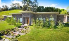  102 Wombeyan Caves Road Woodlands NSW 2575 $2,750,000 This lifestyle property located in Mittagong certainly has the “wow” factor complete with stunning rural views.  From the moment you arrive you will understand that this is not your average home - it really is a modern classic.  Wonderfully positioned close to vineyards and a short drive to Bowral, Mittagong, and Berrima.  A separate and self-contained one-bedroom studio provides the opportunity for extra guest accomodation, or long/short term rental options. Please contact us to make an appointment to view this special property. Features include: Residence: • Architect designed and master built • Stunning entrance foyer  • Double-glazed windows and doors • 3.3m ceiling height throughout (3m in kitchen) • Bi-fold doors leading from the kitchen to terrace • Polished concrete floors and heritage Brush Box repurposed floorboards • Ducted air conditioning • Underfloor hydronic heating • Solar power • Designer kitchen • Picture windows throughout with stunning rural views • Master suite, walk-in dressing room and stunning ensuite • Multiple living areas with coffered ceilings and northerly aspect • Lounge room with glass panelled doors to create a private space • 3 Bedrooms with built-in wardrobes, 2 with ensuite • Garage with covered breezeway access to laundry and mudroom Grounds: • Terrace area is set amongst the kitchen garden and sits beneath an ornamental grape covered pergola • Raised vegtable garden beds • Bore and in-ground concrete tank • Fenced paddock • Silver Birch groves • Fire-pit area Studio: • Self-contained and detached • Reverse-Cycle split system air conditioning • Large picture windows • Spacious bedroom with ensuite • Full kitchen with island bench • Generously-sized living/dining area... 