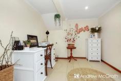  1A Bayview Street Warners Bay NSW 2282 $720,000-$770,000 Light-filled and recently revamped, this modern family home offers versatility and easy living in a central location. An easy stroll to lakeside walking trails, an array of eateries along The Esplanade and the shopping centre. Set over two air conditioned levels, the ground floor comprises a tiled entry foyer which leads into the generous multi-purpose room, and includes a study nook and internal laundry with second bathroom. Upstairs is graced by LED downlights, with polished timber floors throughout the living spaces and fresh carpet through the bedrooms. A bright family lounge room opens to the the covered verandah to overlook the front yard. Adjacent to the lounge is the open dining room and stylish kitchen appointed with stainless steel appliances. The four double bedrooms all offer built-in robes and ceiling fans, and share the modern bathroom complimented by floor to ceiling tiles, chrome fixtures, double floating vanity, glass framed shower and toilet. Outside, low-maintenance gardens and fenced lawn space with additional garden shed storage and a single lock-up garage make this the perfect home for the modern family. Take the tour to experience what this home has to offer! KEY FEATURES: Air Conditioning Built-In Wardrobes Close to Schools Close to Shops Close to Transport Garden... 