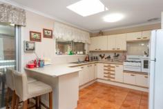  34 Honeysuckle St Mansfield QLD 4122 $595,000 lowset Brick and  tile Large bedrooms with built in cupboards and air con to main Large semi modern kitchen with gas cooktop  and oven Formal lounge dining  with air  con Large family room to  rear of house Shed / workshop  with 15 AMP power Garage  with  auto  door Extra undercover space  for caravan / trailer or  boat Short  walk  to  local shopping Mansfield High school catchment City bus stop just  down the street Elevated position in a quality established neighbourhood Large 612 sq m lot.. 