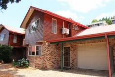  2/1 CEDAR STREET MALENY QLD 4552 $370,000 Only metres from the centre of town this spacious, elevated three bedroom townhouse features an open plan lounge, dining, generous size kitchen with electric appliances, good bench space and storage. The ground level also has a laundry, guest washroom/toilet plus a single lock-up garage. Upstairs the master bedroom has ample storage and an en suite, the main bathroom services the other two bedrooms. There is a courtyard garden, solar power, air conditioning, ceiling fans plus guest parking, all in a well-presented complex of six quality brick and timber townhouses. 