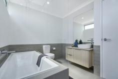 5 Basanite Loop TREEBY WA 6164 $449,000 This stunning brand-new 3 bedroom 2 bathroom two storey home offers quality low-maintenance living and entertaining and is superbly situated on a fantastic Green Title corner block within the wonderful “Calleya Estate” close to future playing fields and within easy walking distance of the proposed town centre where childcare facilities are now available and a café is set to open later this year. Externally, a striking modern façade is complimented with feature brickwork which all blends perfectly internally with a light, bright and open-plan living and dining area, overlooked by an impeccably-appointed kitchen with sparkling stone bench tops and Ilve appliances. While the living space extends out to a pleasant north-facing entertaining alfresco, the dining zone seamlessly flows on to a second paved courtyard – complete with power points and a gas connection for barbecues, just in case some extra unexpected guests pop by. Upstairs, the sleeping quarters are headlined by a large master-bedroom suite where a “his and hers” mirrored built-in wardrobe space meets an intimate front Juliet balcony to watch magical sunsets from, as well as a spacious ensuite bathroom with a huge shower, a toilet and a sleek stone vanity. There are also off-road parking bays for visitors opposite your secure remote-controlled double garage. The estate plays host to a plethora of local parklands whilst also enjoying a very handy proximity to the new Cockburn Aquatic & Recreation Centre (ARC), a junior BMX track, outstanding family playgrounds, a dog adventure playground, barbecue facilities, Atwell Primary School, Cockburn Gateway Shopping Centre, Cockburn Central Train Station, the freeway and a whole lot more. For a residence you will love, look no further! WHAT’S INSIDE: • 3 bedrooms, 2 bathrooms • Light-filled open-plan living and dining areas with access out to their respective front courtyards • Tiled kitchen with stone tops, double sinks, tiled splashbacks, a double pantry, dishwasher and quality Ilve gas-cooktop/oven • Concertina doors reveal a cleverly-concealed European-style laundry downstairs, complete with access to the powder room, plus ample hallway storage in the form of a large four-door linen cupboard opposite • Upstairs bedrooms, including a carpeted north-facing 2nd bedroom with mirrored built-in robes and splendid views to Perth’s rolling hills • Carpeted 3rd bedroom with mirrored BIR’s of its own • Main upper-level bathroom with a shower, separate bathtub, a stone vanity and toilet WHAT’S OUTSIDE: • Remote-controlled double garage with internal shopper’s entry, an under-cover clothesline and access to a rear courtyard that is ideal for bin storage • Alfresco and sitting courtyards off the main open-plan space downstairs • Easy-care reticulated gardens • Off-road parking bays opposite the home EXTRAS: • High ceilings throughout (including to garage) • Quality carpet throughout • Ducted and zoned reverse-cycle air-conditioning • Feature down lighting • Feature skirting boards • Instantaneous Rinnai gas hot-water system • Designed by award-winning architect Hames Sharley • Built by quality W.A. builder Dale Alcock Projects • Green Title corner block • No strata fees to pay LOCATION: • 25-minute drive from Perth CBD • Close to the freeway, shopping and public transport at Cockburn Central (just four stops to the city) • Walk to a plethora of local parklands with playgrounds.. 