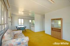 40 Warren Street  Goovigen QLD 4702 $79,000 If you're looking to get away from it all, this is an opportunity worth investigating. A little work is needed, but it would be the perfect next project for the right buyer. High-set home with enclosed under-house area. Large living and dining. Functional kitchen. 2 bedrooms, master has built in robes. Front sleep out, sun-room or office area. Large capacity, poly rainwater tank. Huge 1214* sqm allotment. Walking distance from the local Hotel and the "Golden Park Retreat". This property would serve as the perfect base for "Grey Nomad" tourists. What more could you ask for? Inspection by appointment with the Agent.... 