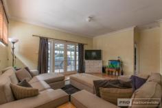  8 Carey St Tumut NSW 2720  $450,000 You will love the large layout of this four-bedroom family home, ideally positioned for all those lifestyle needs of an active family and boasting an enormous 1,349m2 allotment, your possibilities here really are endless. Comprising of multiple indoor living areas, four great sized bedrooms, an oversized multi-purpose outdoor entertaining area and a plethora of space for the kids to play, you will love calling 8 Carey street your home. Call today and book your inspection! Premiere Features: - Four great sized bedrooms all with built in robes - Main Bathroom centrally located and boasting large separate bath, shower and toilet, with an additional powder room area off the entry - Additional renovated second bathroom acting as combined laundry, with good storage options, shower and toilet - Great sized electric kitchen with ample storage options and workspace - Large sun filtered open plan living area positioned to the rear of the plan, with split system air conditioning, wood box fire heater and French doors for direct access to the rear yard - Extra-large fully covered patio serving as dual covered off street parking and large outdoor entertaining area - Large formal dining, with timber flooring, built in fire and ducted evaporative air conditioning, perfect for that much desired second lounge - Double bay shed with power - Additional single bay shed - Rainwater tanks - Fully fenced yard - Extremely large 1,349m2 allotment walking distance from town and rear vehicle access - Positioned directly adjacent River Glade oval - Ducted Evaporative air conditioning throughout - Formal entry with additional storage options - Third outside toilet Positioned a short stroll from the center of town, Tumut river walking tracks and local sporting fields, this large four-bedroom family home is sure to tick a lot of those boxes ideal for growing families. Do not miss your opportunity to secure such a great family home. Call today and book an inspection!.. 