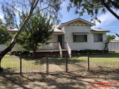  78 Pratten Street Dalby QLD 4405 $269,000 A solid established 4 bedroom home with plenty of room, air conditioning and plenty of sheds on a 1012 Sq m corner block overlooking Thomas Jack Park has to be prime real estate. It is now available for sale for the first time in many years at little more than land value. Within the preferred unit area of town it oozes potential for future development but also, just as it is, provides a very secure safe home to raise yet another family having been very well maintained over the years. Features include a sun room, built ins cupboards, ceiling fan, lock up garage with remote door and open carport, lock up shed down the back of the large yard, fenced on 3 sides, and has a rain water tank, and ramp access to the rear... This is really worth a serious look... 