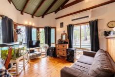  49 Blaxlands Arm Road Laguna NSW 2325 $420,000 to $440,000 – A secluded timber cottage awaits the new owner in the picturesque Wollombi Valley – Rare 5 acre lot in a natural bush land setting, set into the hill with views through the trees towards the surrounding mountains – Inside, cathedral like ceilings adorn the whole of the internal cottage creating a wonderful ambiance – The timber kitchen is open planned and looks out over the living and dining space, timber flooring throughout add to the feel of the cottage – A brand new split system A/C and combustion fireplace make this a comfortable home all year round – The two bedrooms are to one end of the cottage and are quite sizeable, with bush views – The bathroom is combined with the laundry and has a claw foot bath and corrugated iron feature walls – Opening from the living room is the large timber deck overlooking the duck pond, the perfect place to relax, enjoy a BBQ and entertain – Tank water is supplied by an approx 20,000 litre tank and a garden shed for storage complete the package – Mains power, very rare in this location! – A new lifestyle awaits, or the perfect opportunity for a weekender to escape the city life. Call to arrange your inspection today!.. 