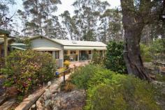  76 Delmonte Avenue Medlow Bath NSW 2780 $535,000 - $565,000 Spacious and welcoming, this Mountains home offers a classic style with gorgeous bushland views. With a Merbau back deck ideal for entertaining, recently updated flooring, instantaneous gas hot water, and an open kitchen with a leafy outlook, this home is a warm and comfortable option for those looking to make the tree change. 3 upstairs bedrooms, main with ensuite, plus additional full bathroom. Large studio/bedroom with ensuite downstairs 9ft high ceilings, and large windows with Venetian blinds overlooking picturesque native fauna Updated within last 5 years, with new flooring and Merbau back deck ideal for entertaining Air conditioning, ceilings fans, and slow combustion heater for year-round comfort Established front garden Instantaneous gas hot water Water storage tanks for garden use, and Honda fire pump for emergencies Colorbond guttering, and security spotlight above bedrooms Excellent TV reception, and NBN connection already established Open kitchen with leafy outlook Bathroom offering separate bath and shower Comfortable and welcoming, this home would make a perfect buy for the savvy purchaser... 